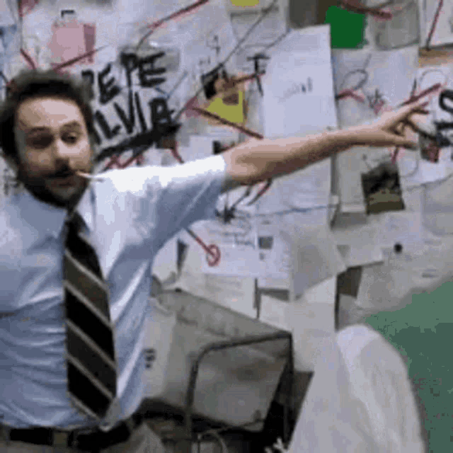 a gif from it's always sunny with a drawing board